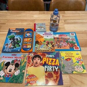 Children's lot of books with water/ snack bottle